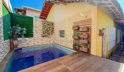 Casa com 2 dormitórios à venda, 70 m² por R$ 420.000,00 - Caiçara - Praia Grande/SP