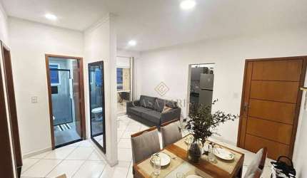 Apartamento com 2 dormitórios à venda, 75 m² por R$ 560.000 - Tupi - Praia Grande/SP