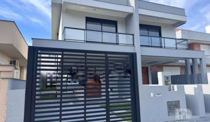 Casa com 3 Suítes e Churrasqueira!
