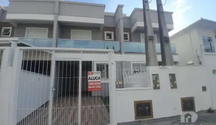 Sobrado geminado, 2 suítes na Nova Palhoça