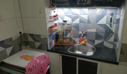 Apartamento tipo conjugado com cozinha separada no centro do Rio de Janeiro