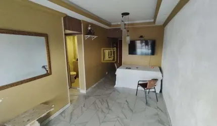 Apartamento de Dois Quartos com Suíte no Centro