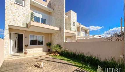Casa com 3 dormitórios à venda, 140 m² por R$ 695.000,00 - Renascença - Gravataí/RS