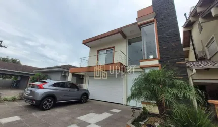 Casa com 4 dormitórios à venda, 174 m² por R$ 930.000,00 - Villa Lucchesi - Gravataí/RS