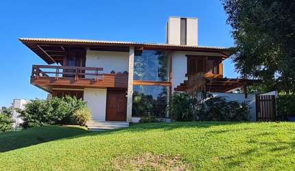 Casa Bairro Cacupé em condomínio fechado