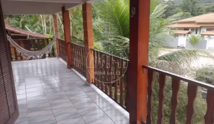 Casa em condomínio fechado com 4 quartos à venda em Ressaca, Ubatuba  por R$ 1.280.000