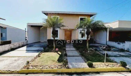 Casa com 4 dormitórios à venda, 222 m² por R$ 980.000,00 - Condomínio Pinheiros de Tremembé - Tremembé/SP