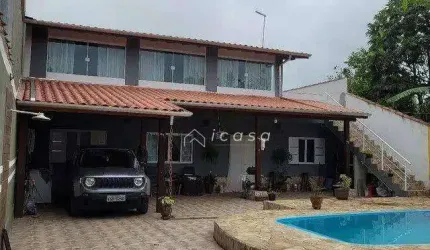 Casa com 4 dormitórios à venda, 247 m² por R$ 986.000,00 - Porto Novo - Caraguatatuba/SP