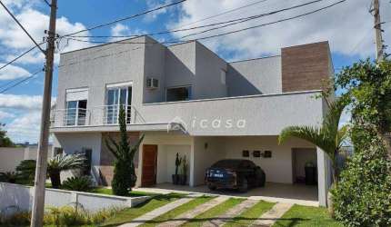 Sobrado com 3 dormitórios, 365 m² - venda por R$ 1.800.000,00 ou aluguel por R$ 13.862,00/mês - Condomínio Lago Dourado - Jacareí/SP