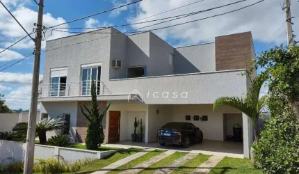Sobrado com 3 dormitórios, 365 m² - venda por R$ 1.800.000,00 ou aluguel por R$ 13.862,00/mês - Condomínio Lago Dourado - Jacareí/SP