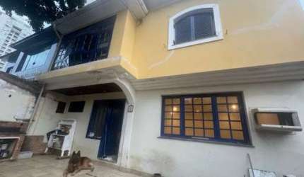 Casa com 3 dormitórios, 170 m² - venda por R$ 1.600.000,00 ou aluguel por R$ 12.000,00 - Gonzaga - Santos/SP