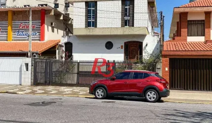 Sobrado com 4 dormitórios à venda, 390 m² por R$ 1.750.000,00 - Boqueirão - Santos/SP