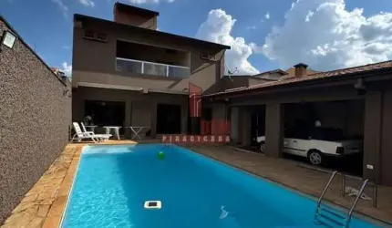 Sobrado com 4 dorms, 3 suítes, piscina e área goutmet.