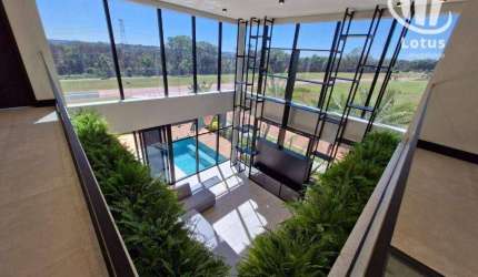 Casa com 4 dormitórios à venda, 357 m²