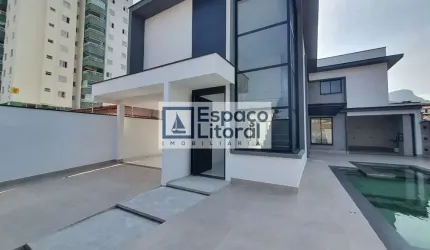 Sobrado novo com 4 dormitórios à venda, 245 m² por R$ 1.950.000,00 - Indaiá - Caraguatatuba/SP