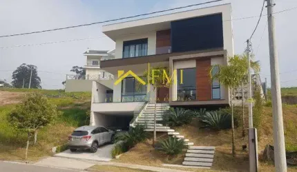 Casa com 4 suítes e aera de lazer no condomínio Recanto dos Eucaliptos