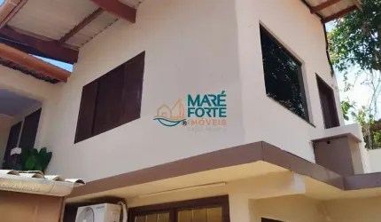 Sobrado residencial e pontos comerciais