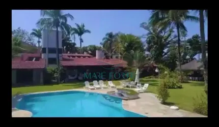 LINDA CASA DE FRENTE PARA O MAR EM CONDOMINIO FECHADO