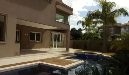 Alphaville 11 - Casa com 750m², 7 Suítes, 6 Vagas e Espaço Gourmet com Piscina e