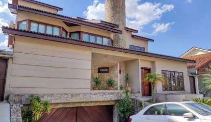 Casa com 4 dormitórios à venda, 537 m² por R$ 2.750.000 - Morada das Flores (Ald