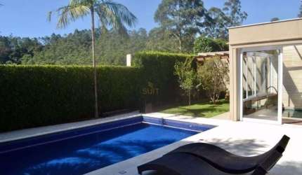 Casa com 4 dormitórios à venda, 450 m² por R$ 6.890.000 - Tamboré - Santana de P