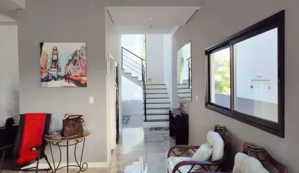 Casa com 3 dormitórios à venda, 290 m² por R$ 1.850.000 - Suru - Santana de Parn