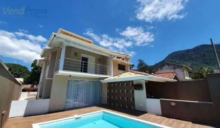 Casa com 3 dormitórios à venda, 298 m² por R$ 1.700.000,00 - São Francisco - São Sebastião/SP