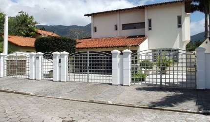 Casa com 3 dormitórios, 420 m² - venda por R$ 1.800.000,00 ou aluguel por R$ 7.000,00/mês - Arrastão - São Sebastião/SP