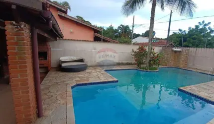 Casa térrea com piscina, sauna e area gourmet, a venda no Indaiá em Bertioga-SP