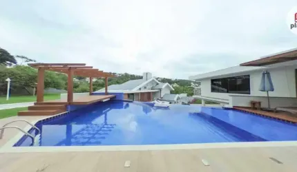 Casa em Condomínio à venda, no Bairro Bosque das Mansões, São José-SC, com 3 quartos, sendo 3 suítes, com 6 vagas