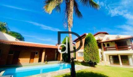 Casa com 4 dormitórios à venda, 386 m² por R$ 1.700.000,00 - Condomínio Marambaia - Vinhedo/SP