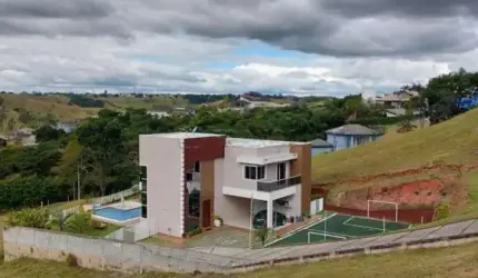 CASA EM CONDOMINIO 04 DOMITÓRIOS SENDO 02 SUITE - RIO COMPRIDO - JACAREÍ SP