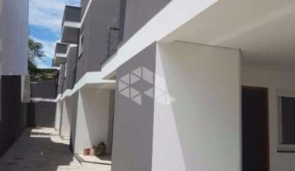 Casa em condomínio fechado com 3 quartos à venda na Rua Mamoré, 168, Igara, Canoas, 114 m2 por R$ 499.799