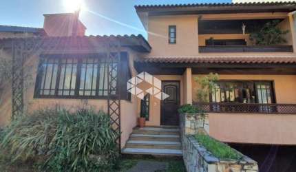 Casa em condomínio fechado com 3 quartos à venda na Rua Tocantins, 869, Agronomia, Porto Alegre, 284 m2 por R$ 1.560.000