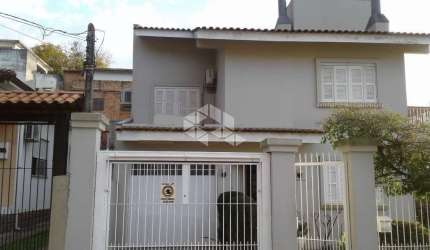 Casa com 3 quartos à venda na Rua Mathilde Zatar, 261, Nonoai, Porto Alegre, 290 m2 por R$ 1.500.000