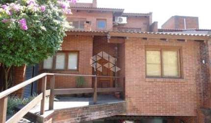 Casa em condomínio fechado com 4 quartos à venda na Rua Bazilio Pellin Filho, 900, Vila Conceição, Porto Alegre, 400 m2 por R$ 1.590.000