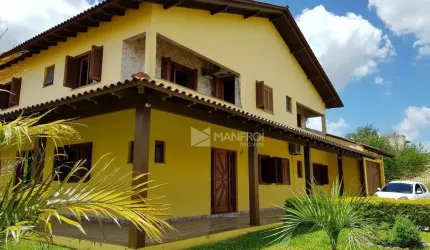Casa com 5 dormitórios à venda, 509 m² por R$ 1.699.990,00 - Parque Santa Fé - Porto Alegre/RS