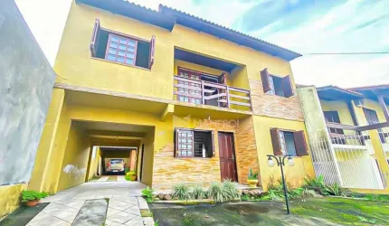 Sobrado com 3 dormitórios à venda, 200 m² por R$ 589.990,00 - Porto Verde - Alvorada/RS