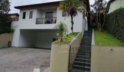 Casa com 3 dormitórios, 200 m² - venda por R$ 1.800.000,00 ou aluguel por R$ 8.000,00/mês - Condomínio Arujá Country Club - Arujá/SP