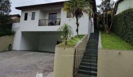 Casa com 3 dormitórios, 200 m² - venda por R$ 1.800.000,00 ou aluguel por R$ 8.000,00/mês - Condomínio Arujá Country Club - Arujá/SP