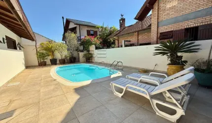 Casa em condomínio fechado com 5 quartos à venda na Travessa América, 68, Coqueiros, Florianópolis por R$ 2.650.000