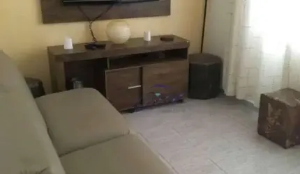 Casa com 2 dormitórios à venda, 150 m² por R$ 480.000,00 - Caiçara - Praia Grande/SP
