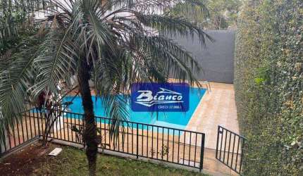 Vende casa com piscina! Rua de cima do Bosque Maia com linda vista para a natureza!!