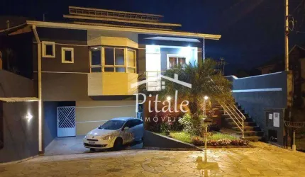 Casa com 3 dormitórios à venda, 369 m² por R$ 1.300.000 - Parque Nova Jandira - Jandira/SP