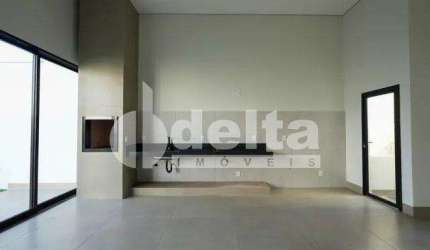 Casa residencial disponível para locação e venda no bairro Quinta Alto Umuarama em Uberlândia-MG