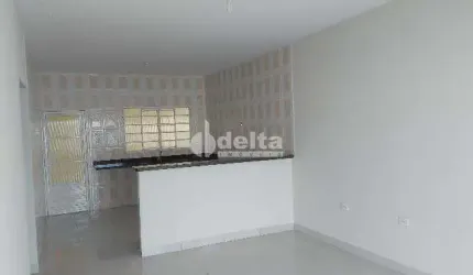 Casa residencial disponível para venda no bairro Jardim Holanda em Uberlândia - MG.