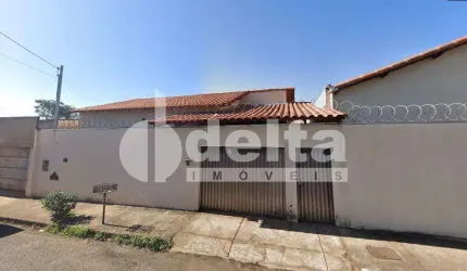Casa residencial disponível para venda no bairro Jardim Canaã em Uberlândia-MG