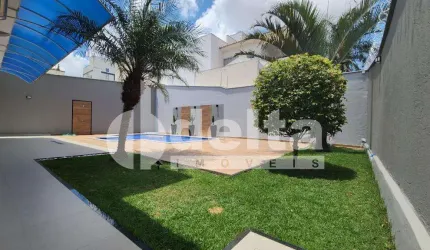 Casa residencial disponível para venda no bairro Jardim Karaíba em Uberlândia-MG