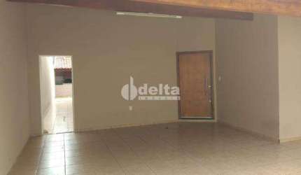 Casa residencial disponível para locação e venda no bairro Santa Mônica em Uberlândia-MG