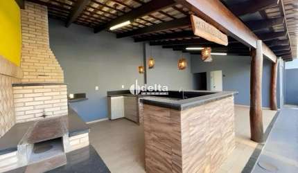 Casa residencial disponível para locação no bairro Santa Mônica em Uberlândia-MG.